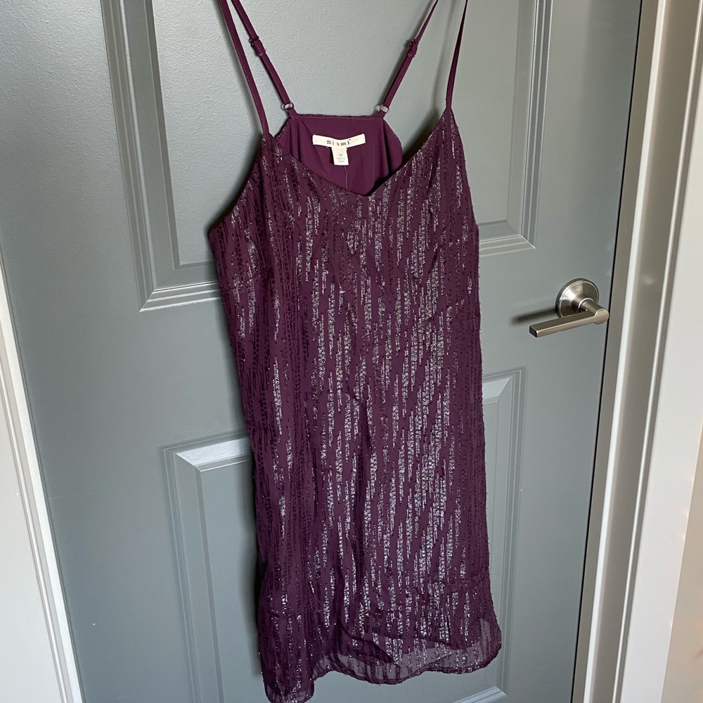 Sassy purple dress with sparkly black sequin!